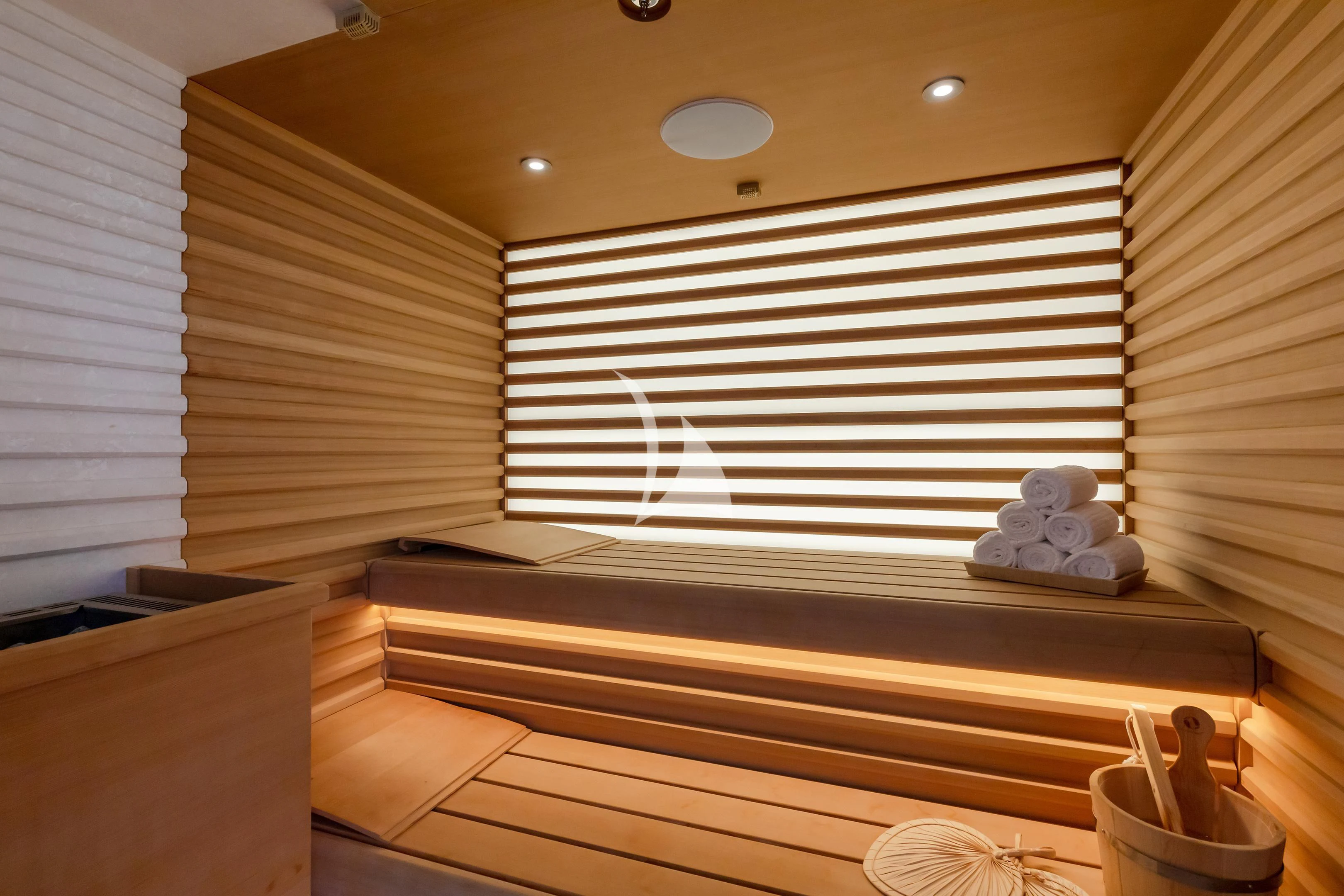 a room with a large window and a white stuffed animal on the wall aboard COME TOGETHER Yacht for Charter