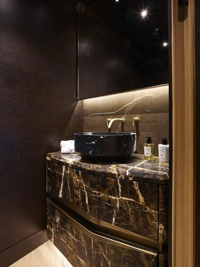 a black stove with a pot on top aboard COME TOGETHER Yacht for Charter