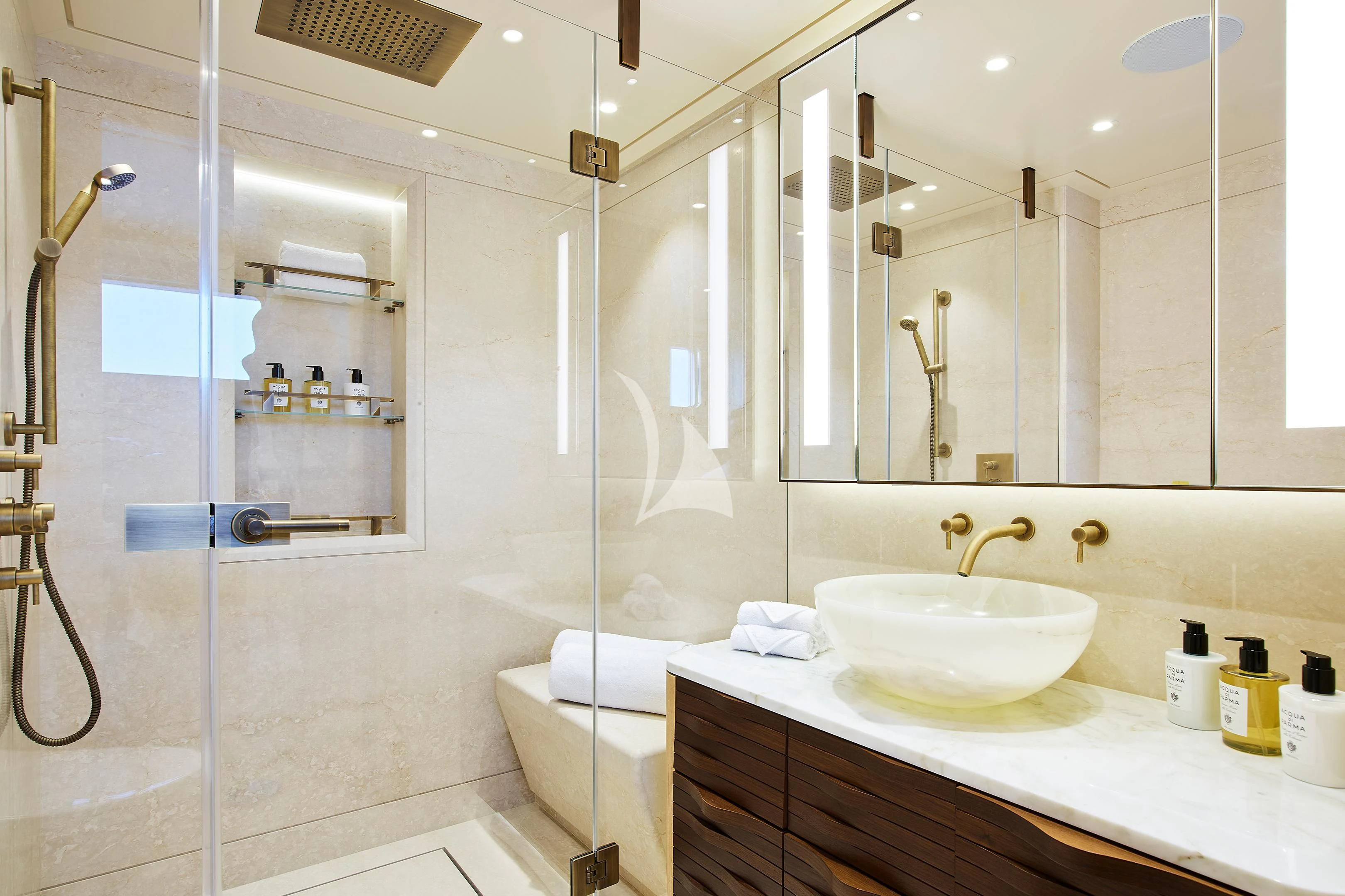 a bathroom with a glass shower aboard COME TOGETHER Yacht for Charter