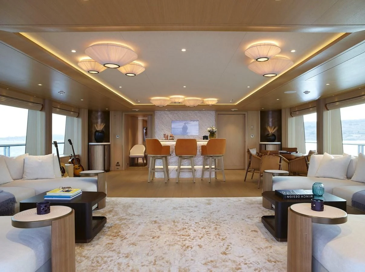 a living room with a large open floor plan aboard COME TOGETHER Yacht for Charter