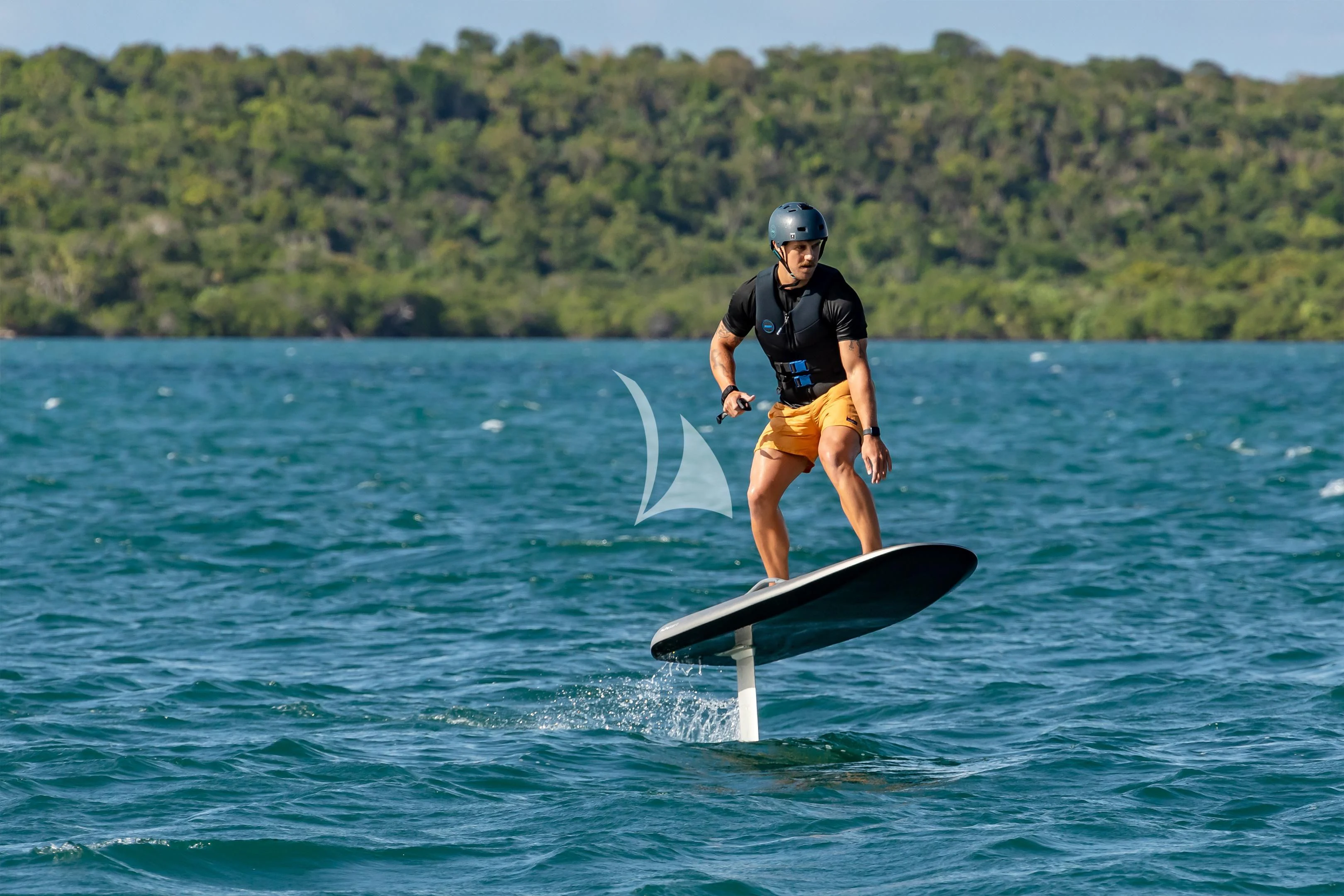 a man is water skiing aboard COME TOGETHER Yacht for Charter