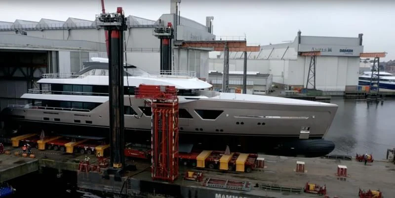 a large white ship docked aboard COME TOGETHER Yacht for Charter