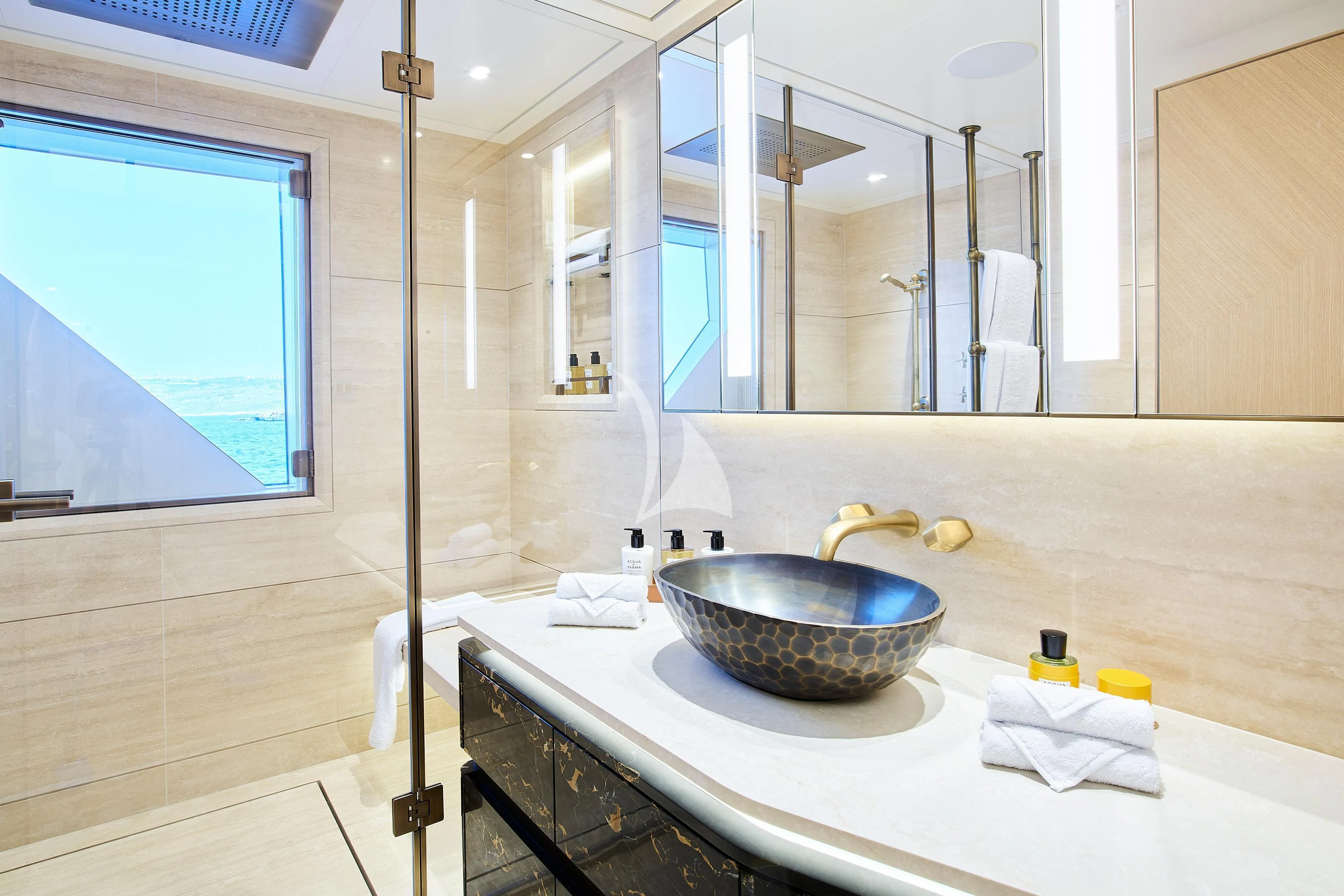 a bathroom with a sink and a tub aboard COME TOGETHER Yacht for Charter