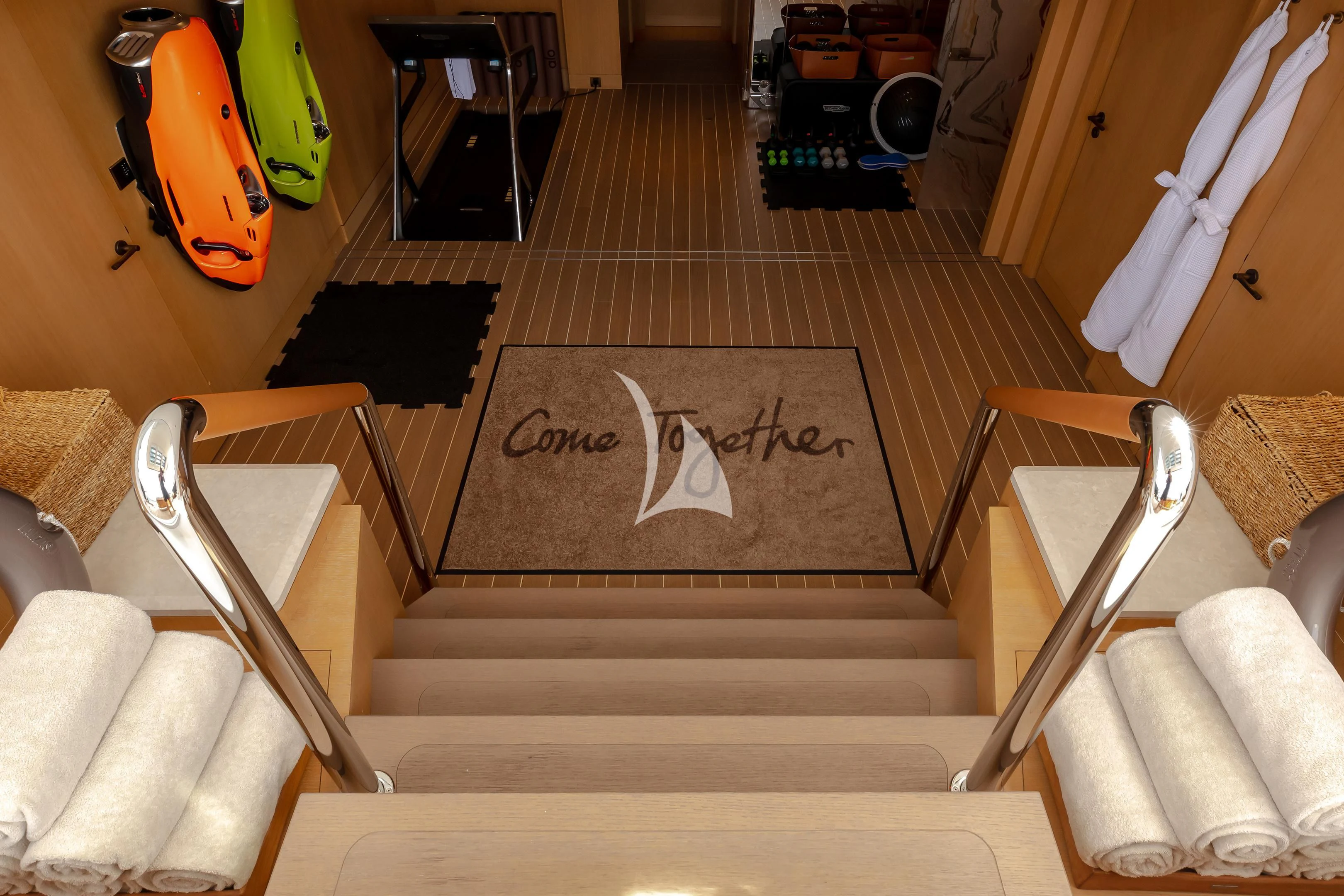 a set of stairs with a rug on the floor aboard COME TOGETHER Yacht for Charter
