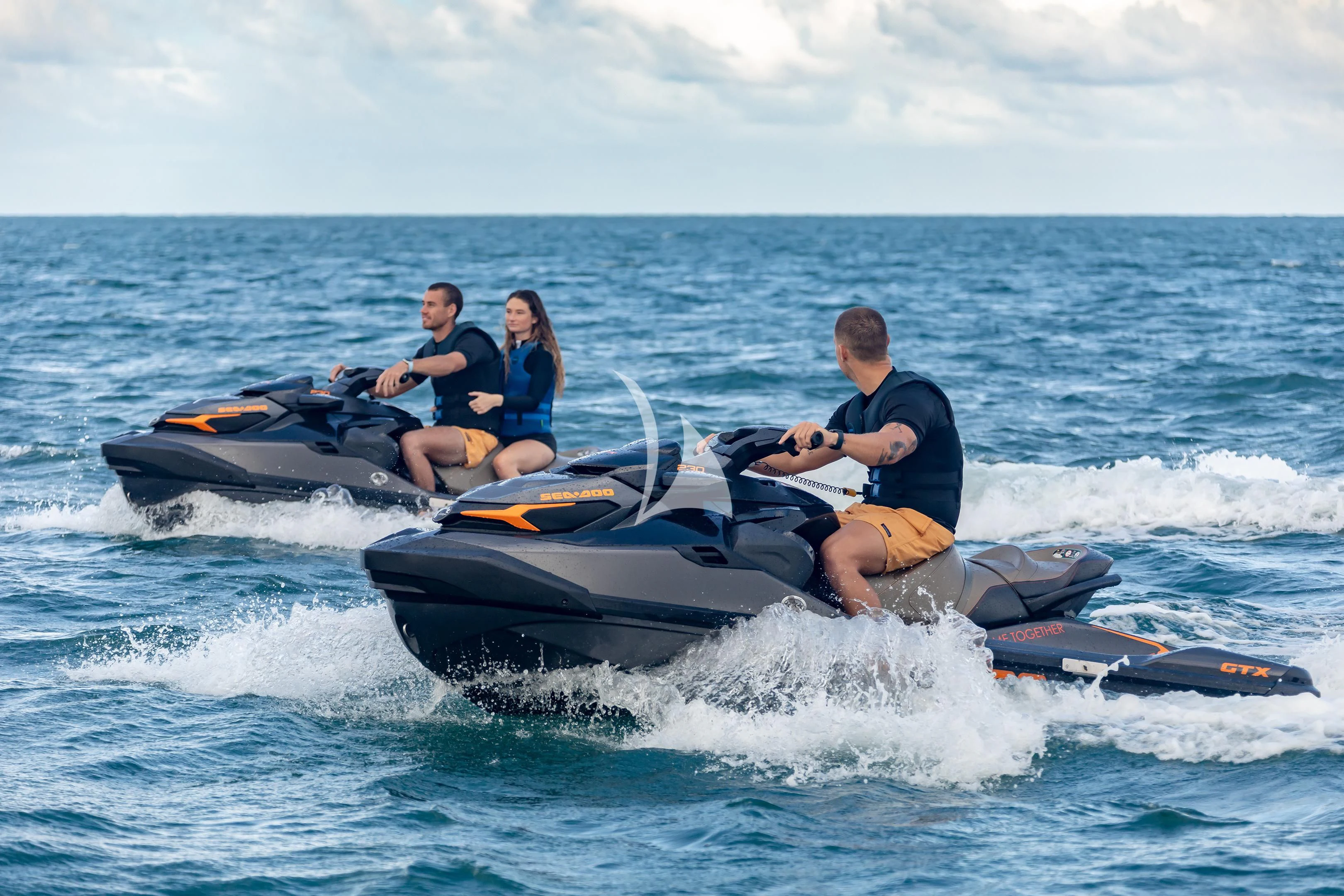a group of people on a raft in the water aboard COME TOGETHER Yacht for Charter