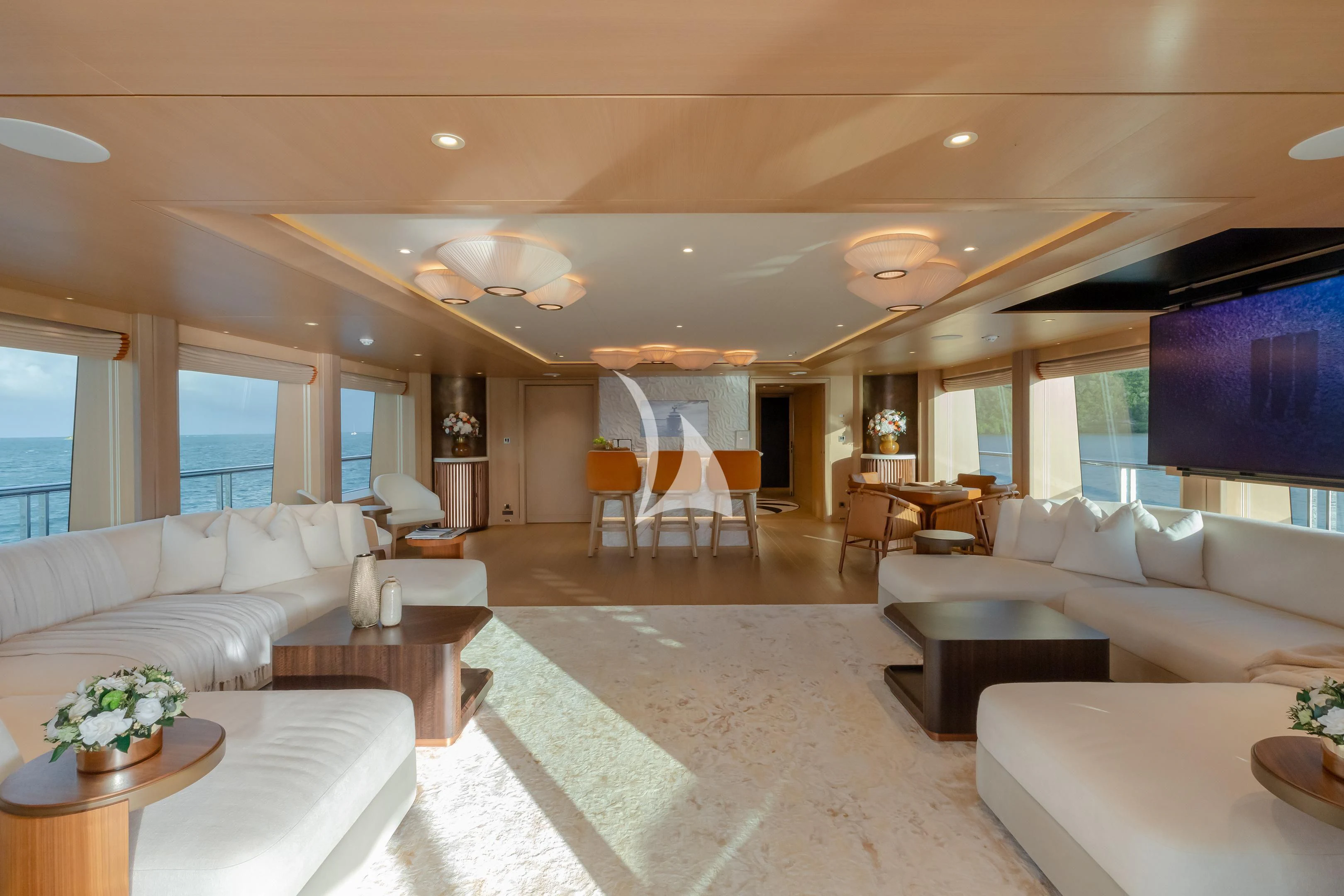 a living room with a large window aboard COME TOGETHER Yacht for Charter