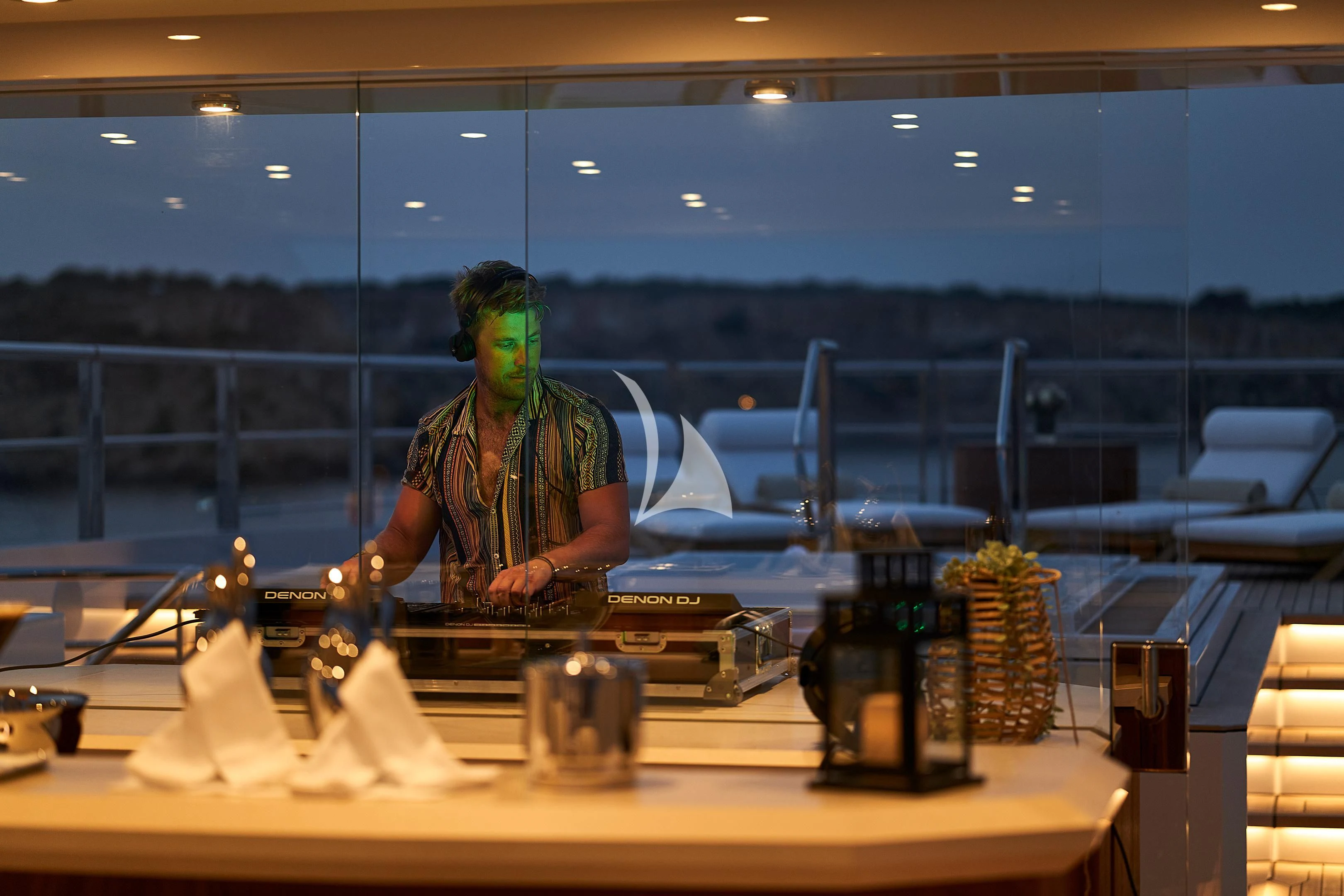 a person wearing a mask aboard COME TOGETHER Yacht for Charter