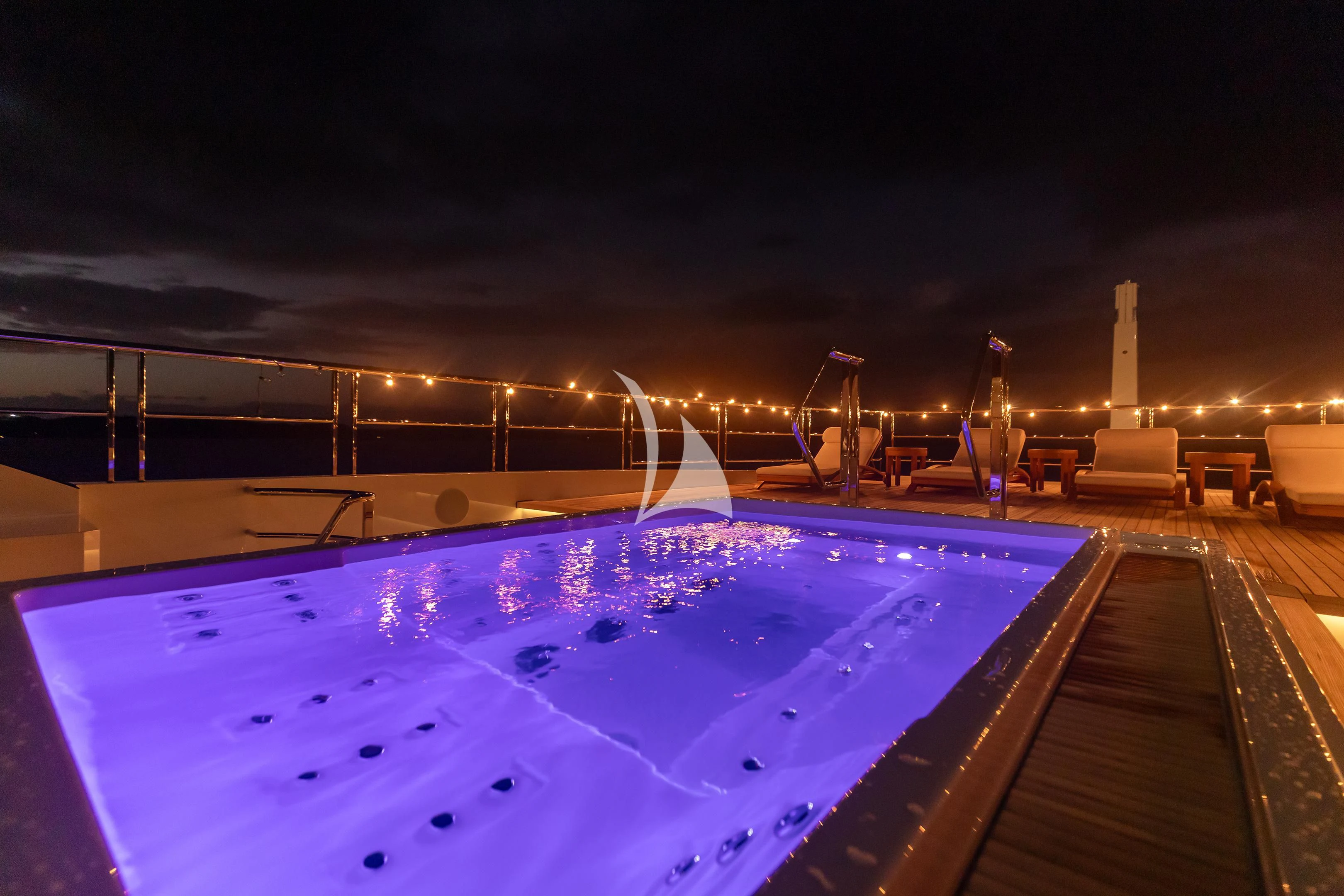 a large pool with lights aboard COME TOGETHER Yacht for Charter