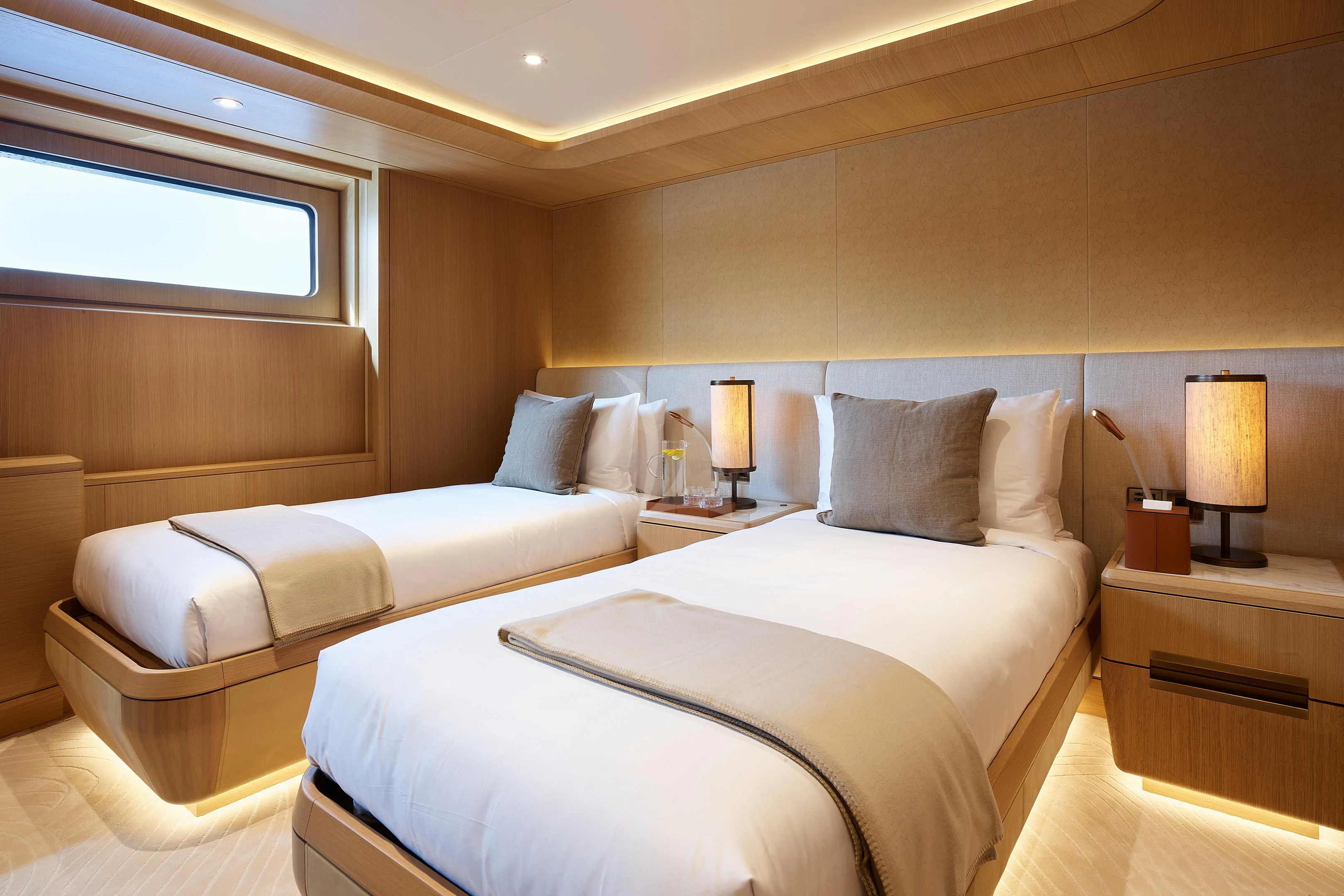 a room with two beds aboard COME TOGETHER Yacht for Charter