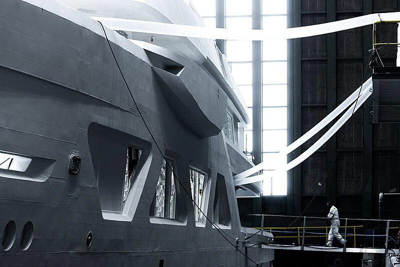 a person walking on a platform aboard COME TOGETHER Yacht for Charter