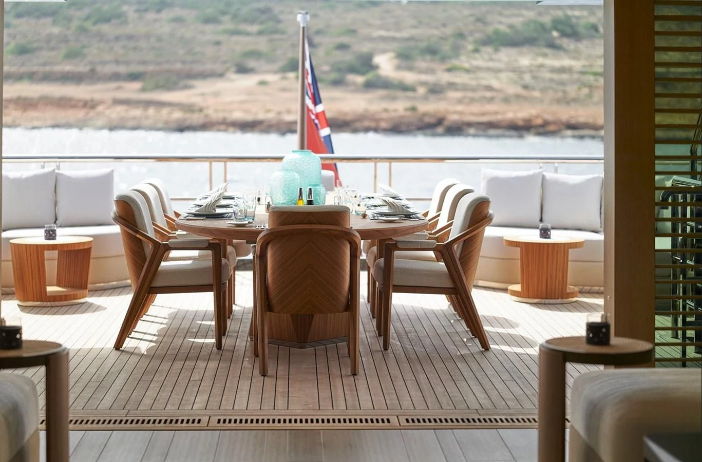 a table with chairs around it aboard COME TOGETHER Yacht for Charter