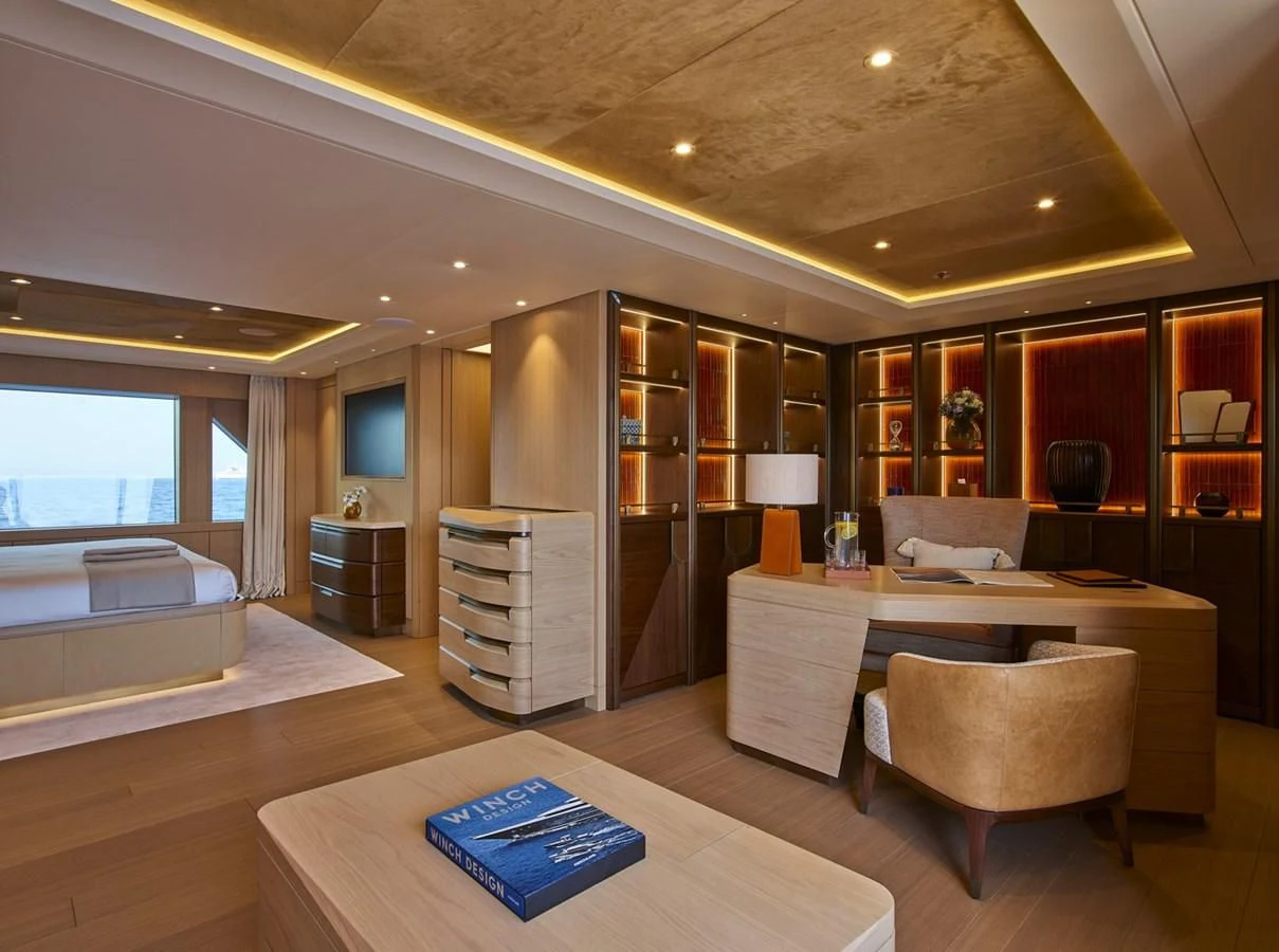 a large room with a table and chairs aboard COME TOGETHER Yacht for Charter