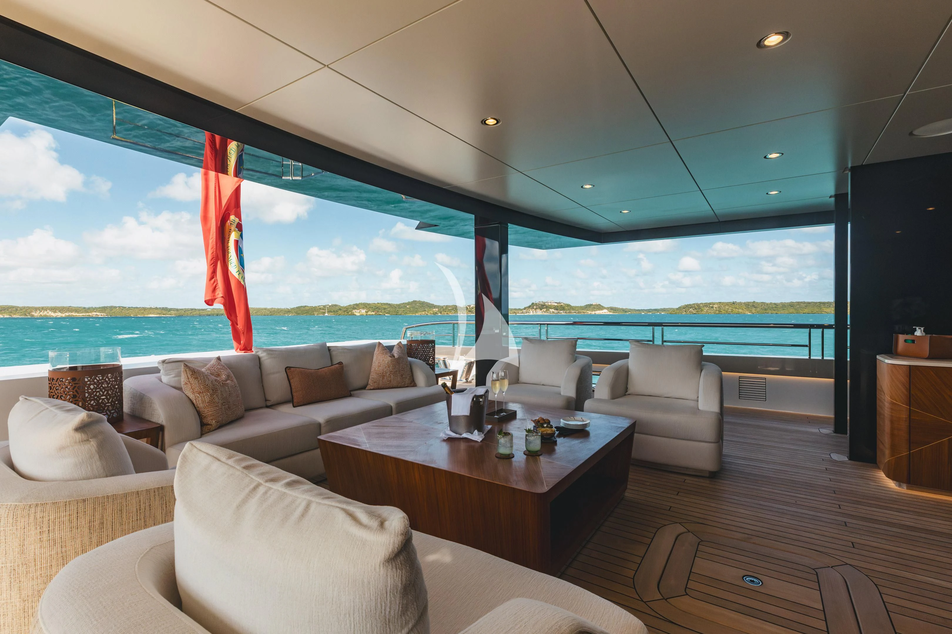 a living room with a large window aboard COME TOGETHER Yacht for Charter