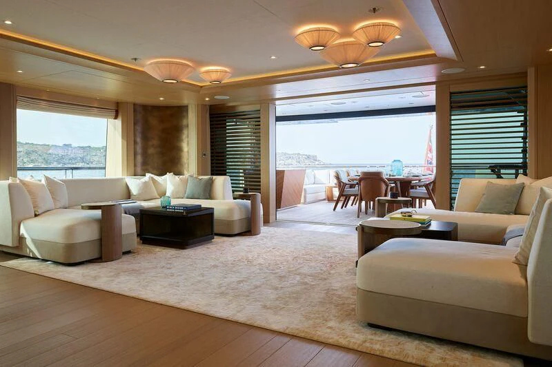 a living room with a large window aboard COME TOGETHER Yacht for Charter