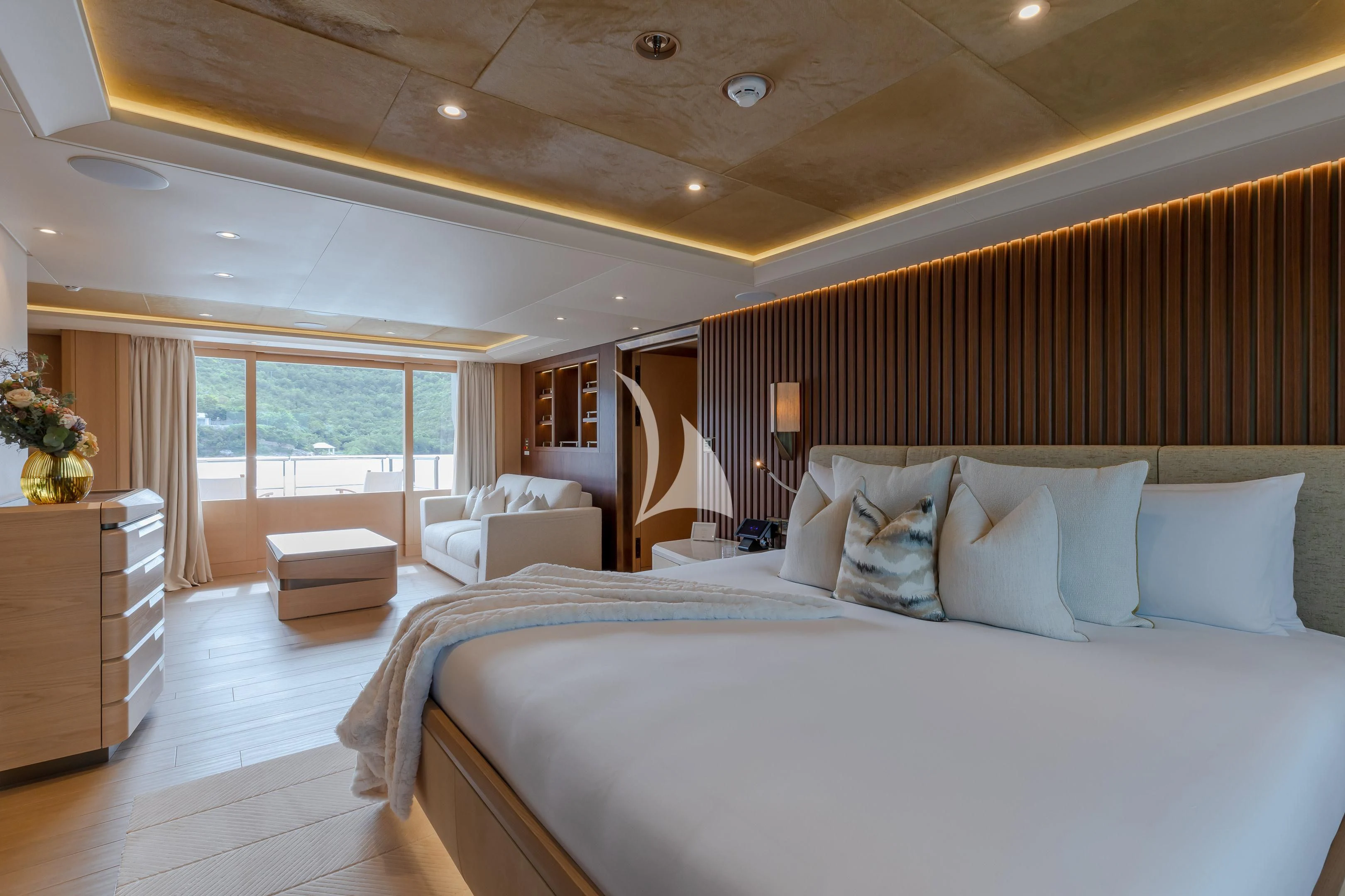 a large bedroom with a large bed aboard COME TOGETHER Yacht for Charter