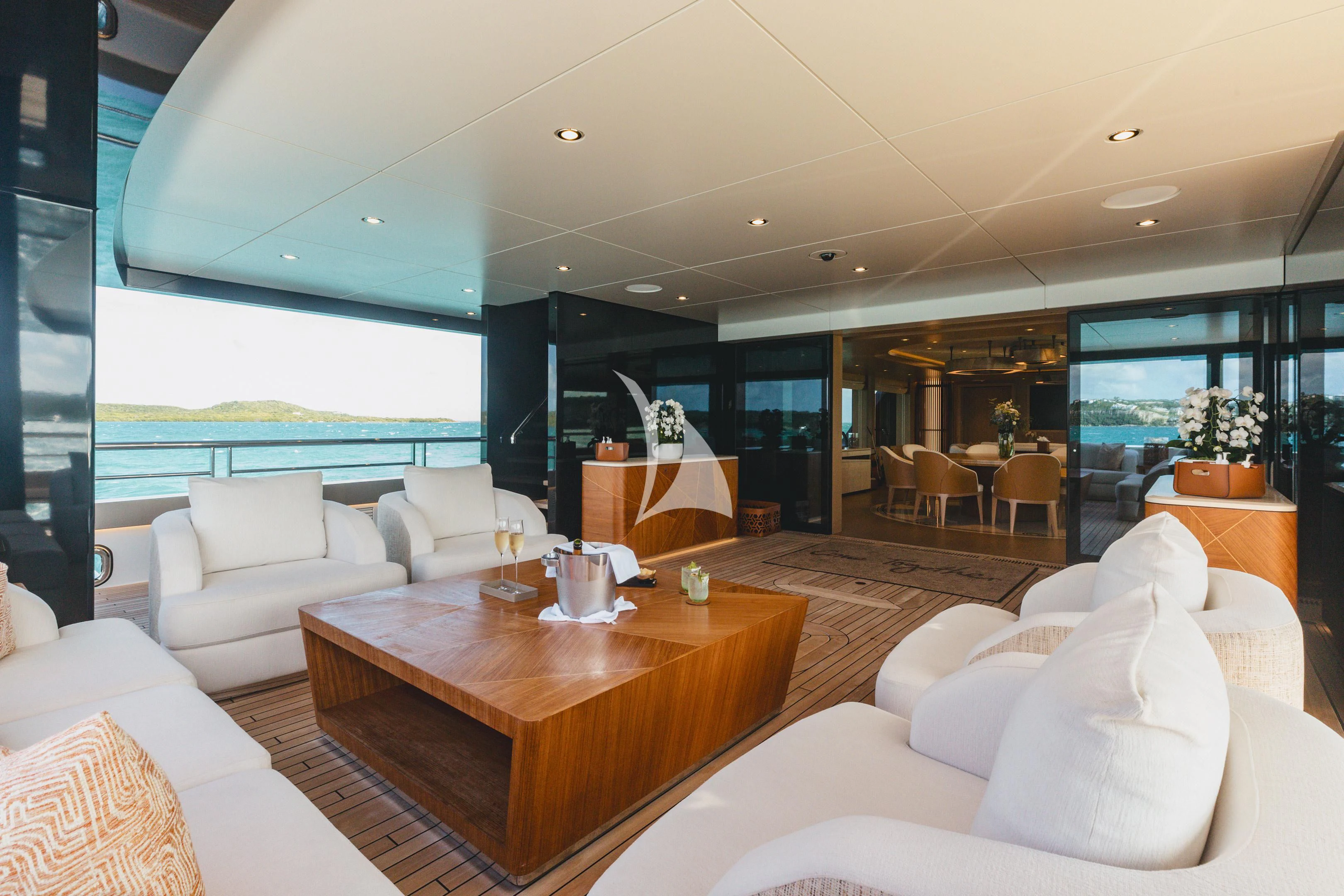 a living room with a large window aboard COME TOGETHER Yacht for Charter