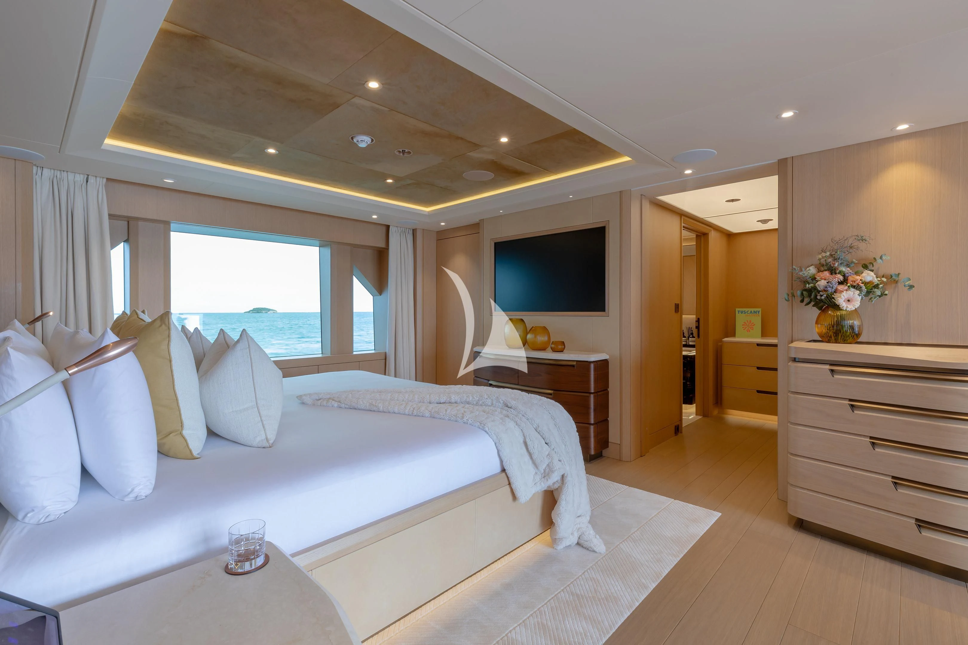 a bedroom with a large bed aboard COME TOGETHER Yacht for Charter