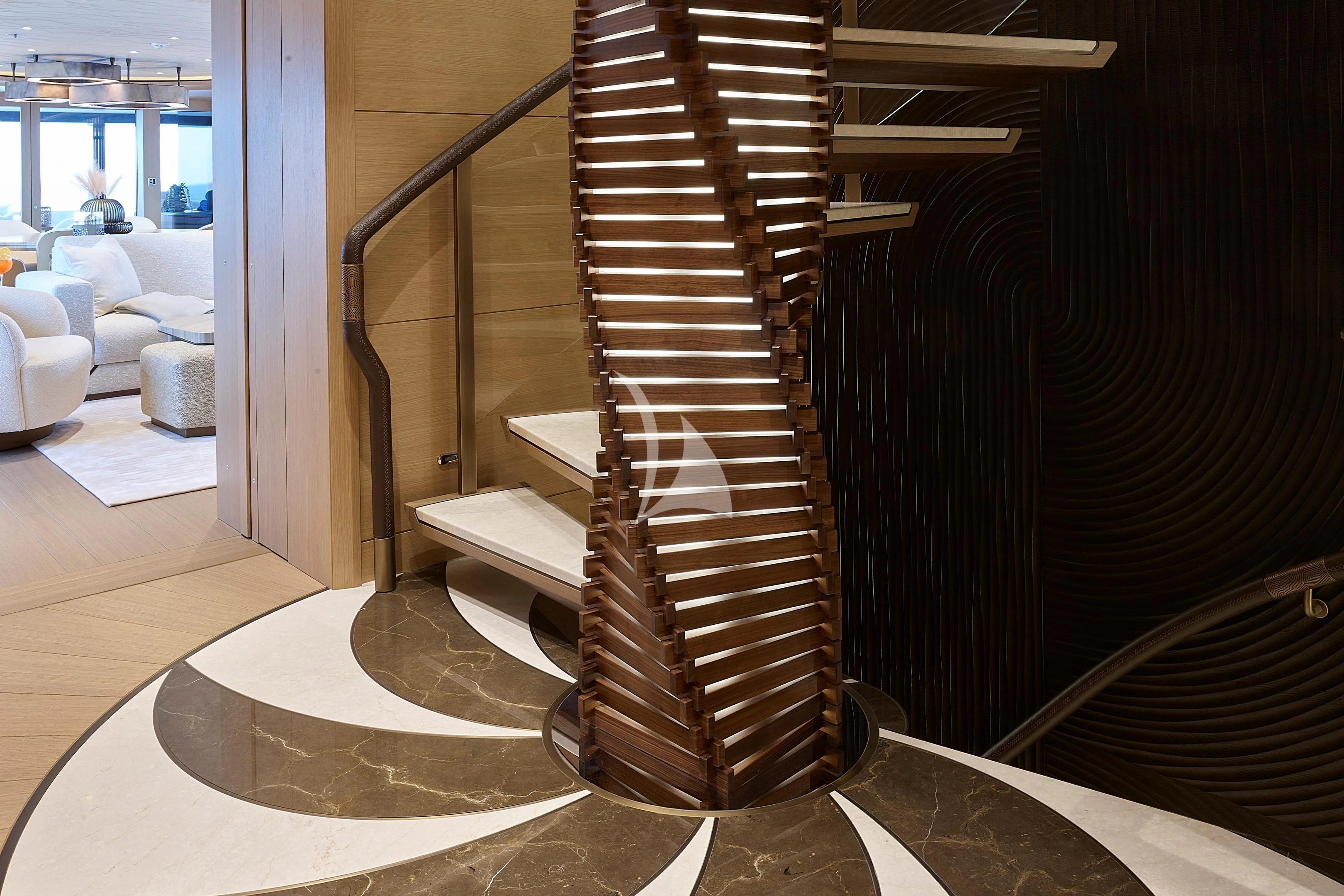 a tall metal staircase in a room aboard COME TOGETHER Yacht for Charter