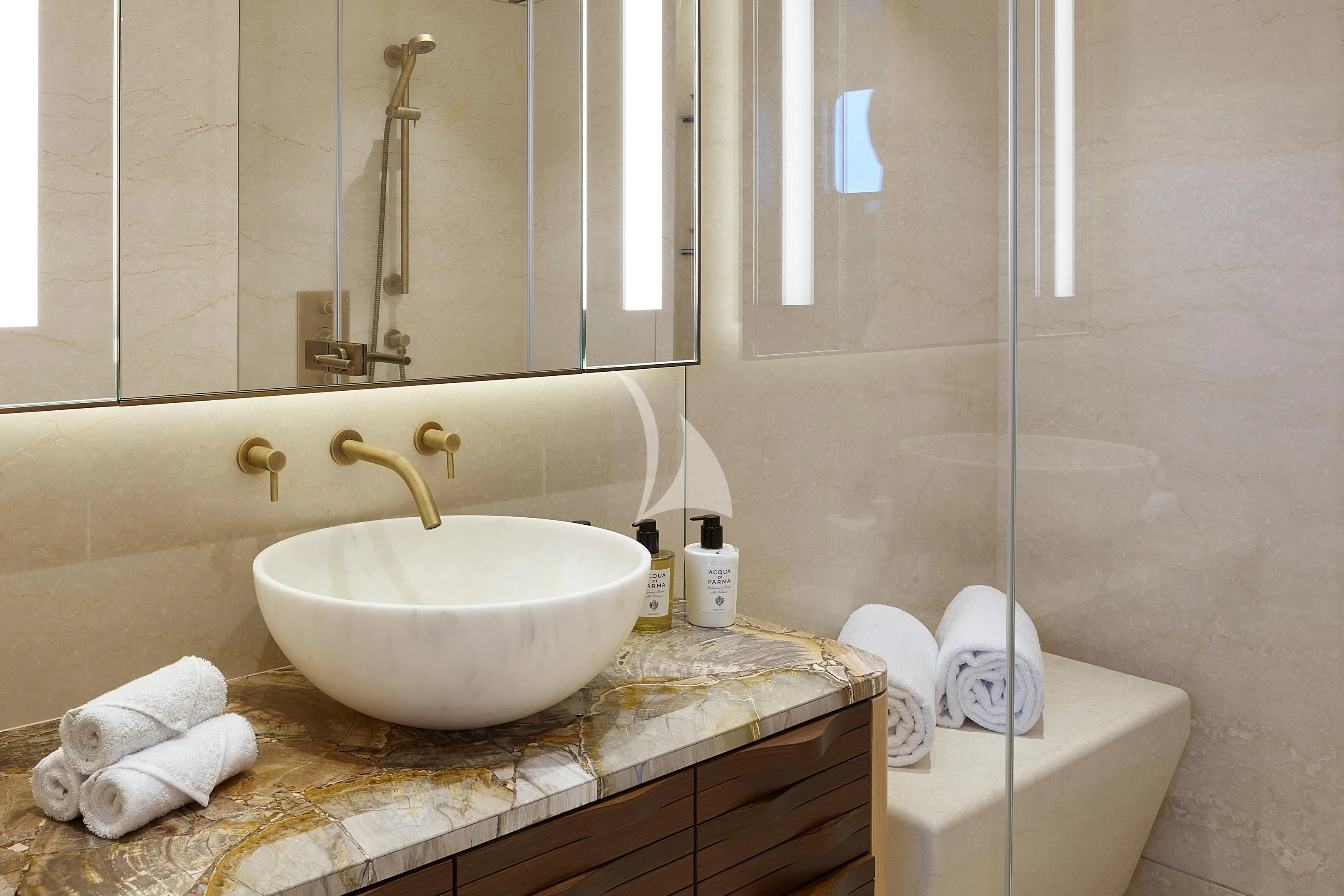 a bathroom with a sink and bathtub aboard COME TOGETHER Yacht for Charter