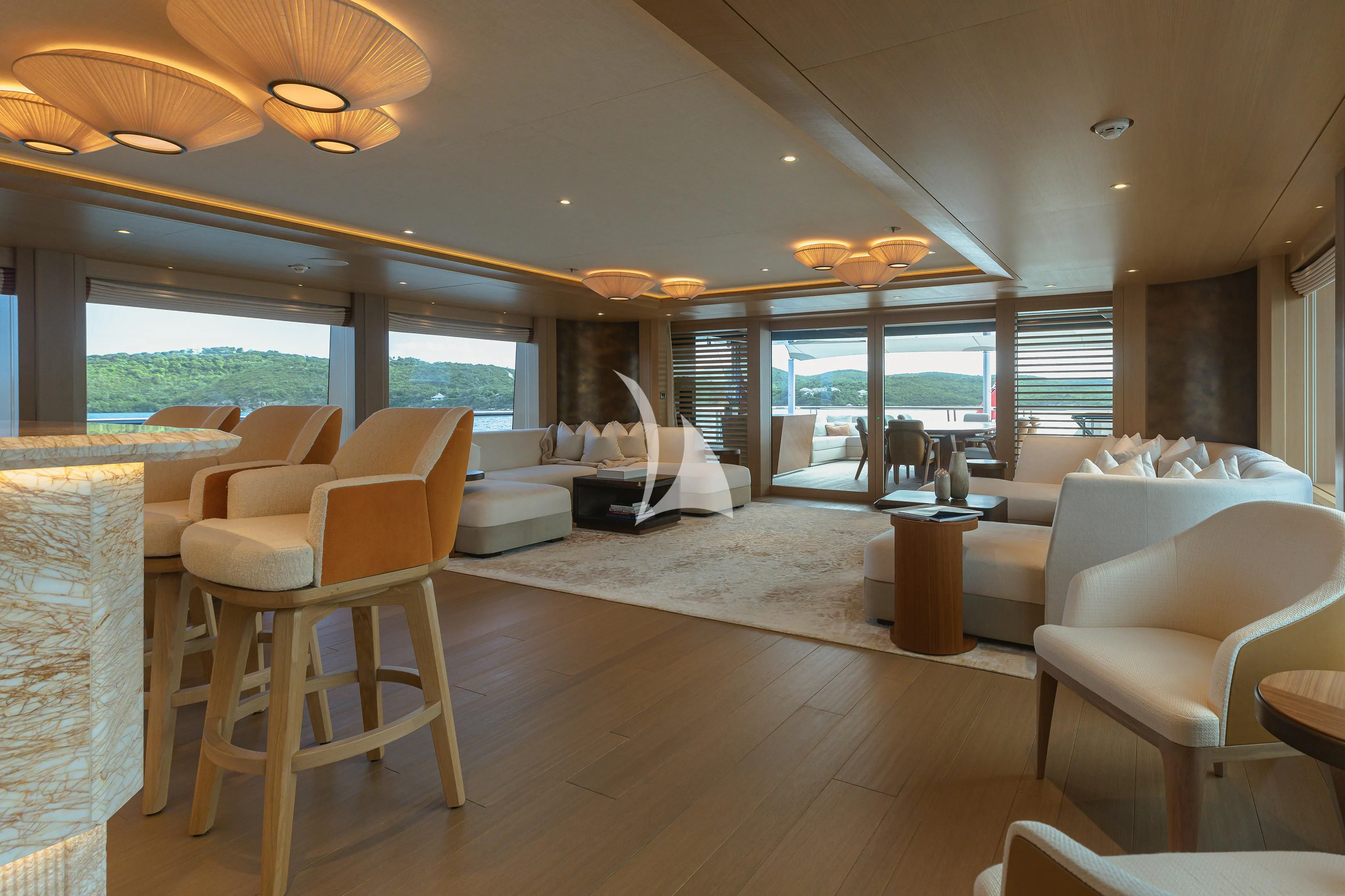 a living room with a large window aboard COME TOGETHER Yacht for Charter
