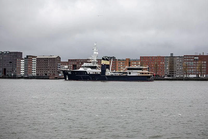 a large ship in the water aboard SHERPA Yacht for Sale