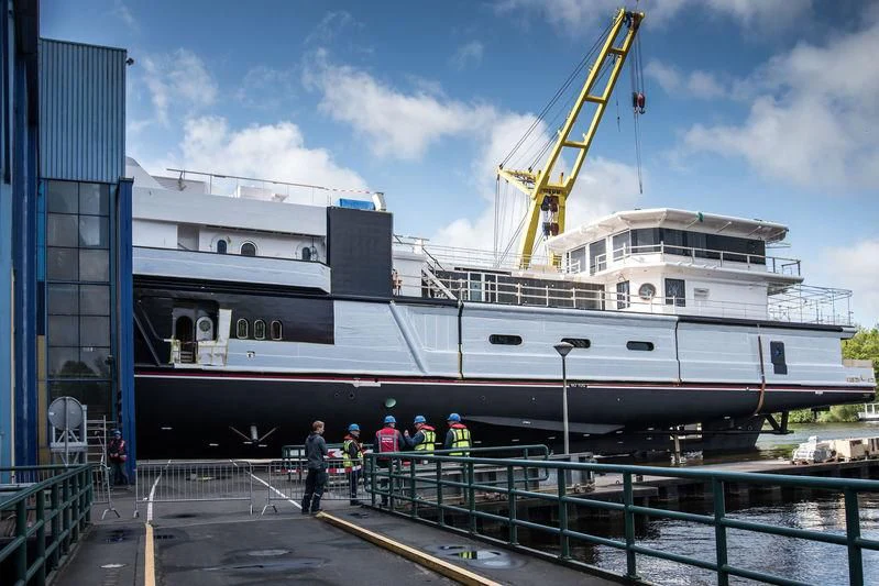 a large ship docked aboard SHERPA Yacht for Sale