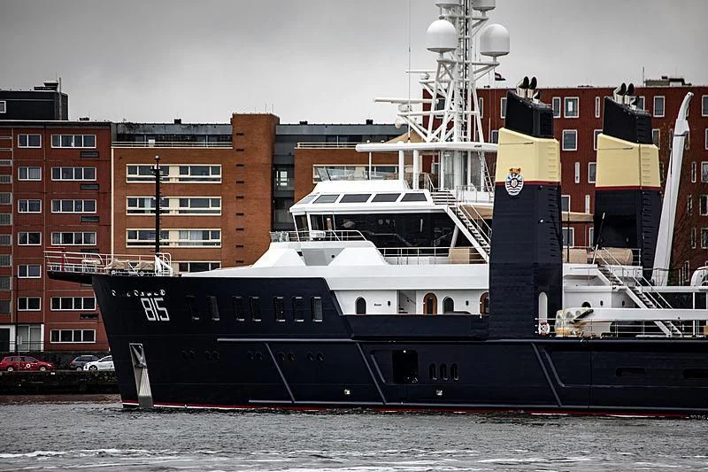 a large ship docked aboard SHERPA Yacht for Sale