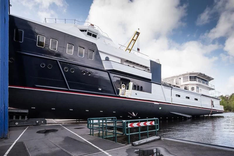 a large ship docked aboard SHERPA Yacht for Sale