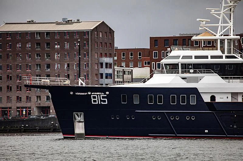 a large boat in the water aboard SHERPA Yacht for Sale
