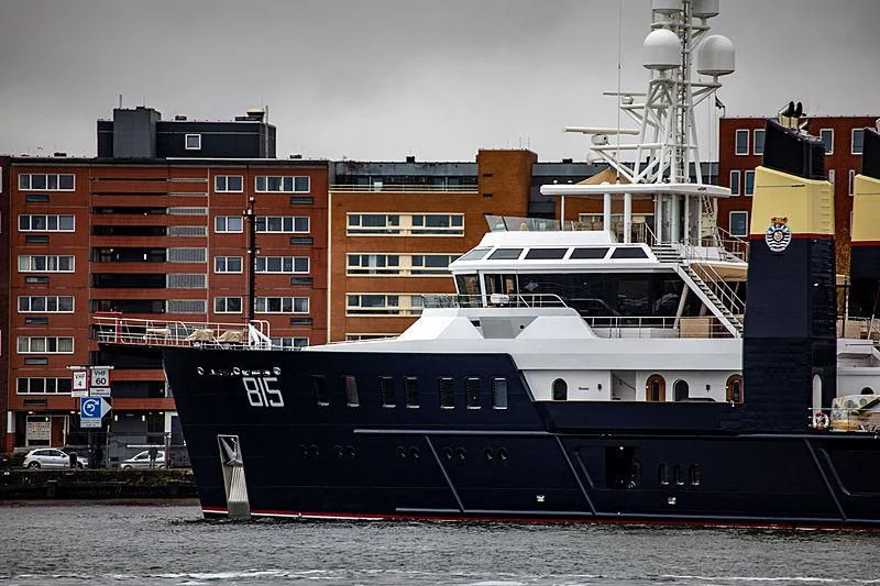 a large ship docked aboard SHERPA Yacht for Sale