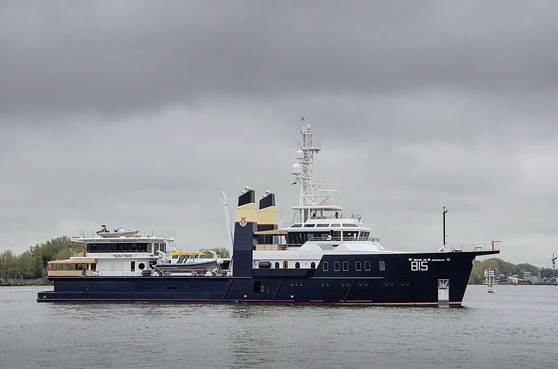 a large ship in the water aboard SHERPA Yacht for Sale