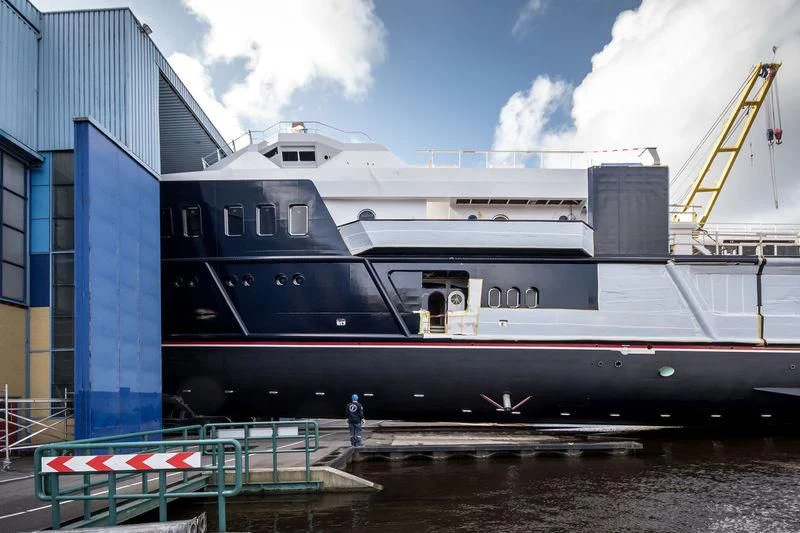 a large ship in a dock aboard SHERPA Yacht for Sale