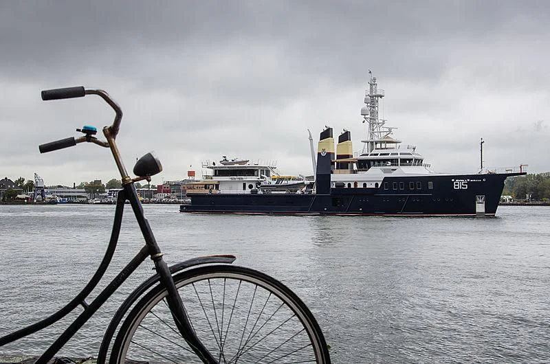a bicycle parked next to a boat aboard SHERPA Yacht for Sale