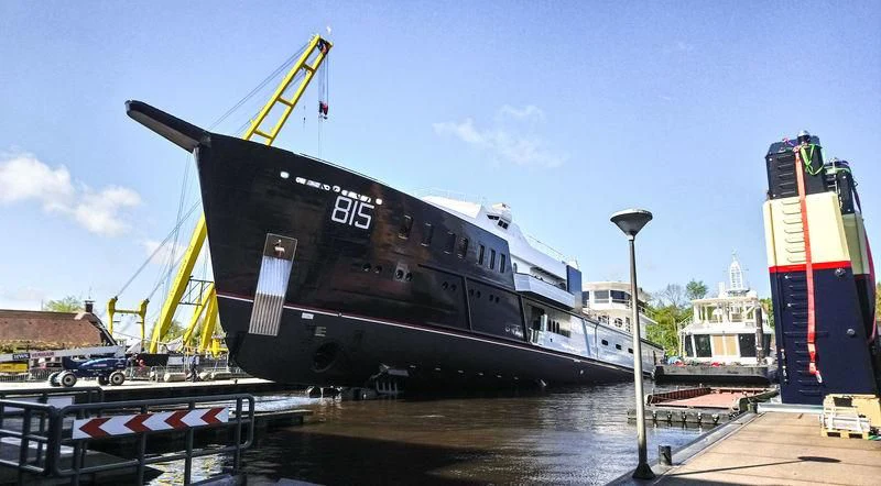 a large ship docked aboard SHERPA Yacht for Sale
