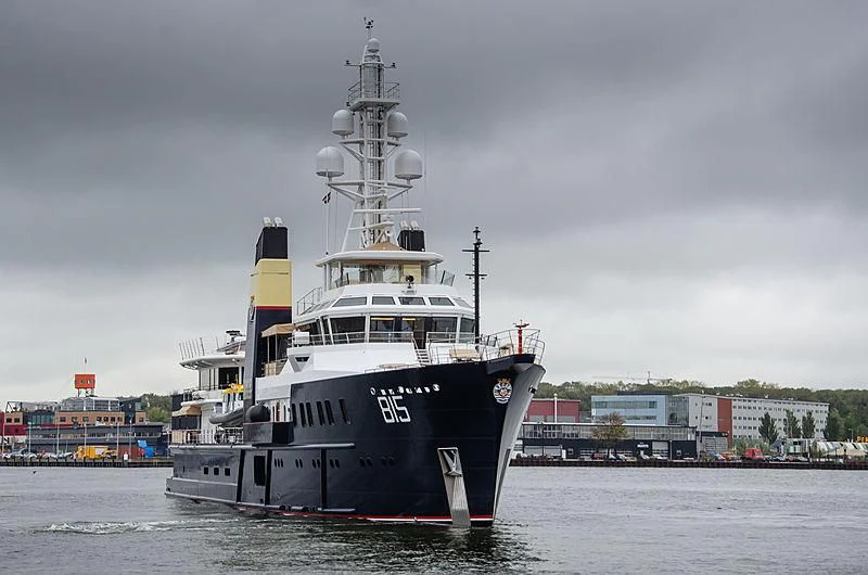 a large ship in the water aboard SHERPA Yacht for Sale