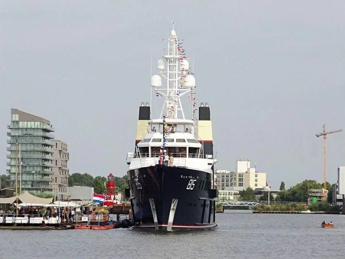 a large boat in the water aboard SHERPA Yacht for Sale