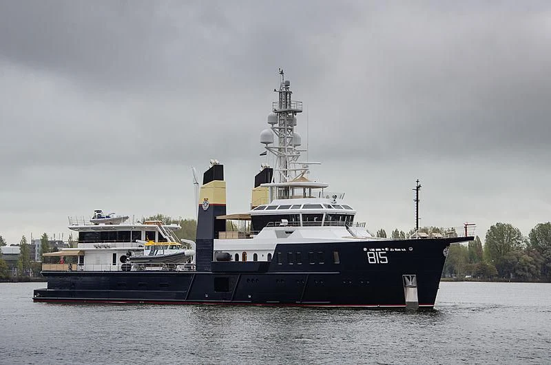 a large ship in the water aboard SHERPA Yacht for Sale
