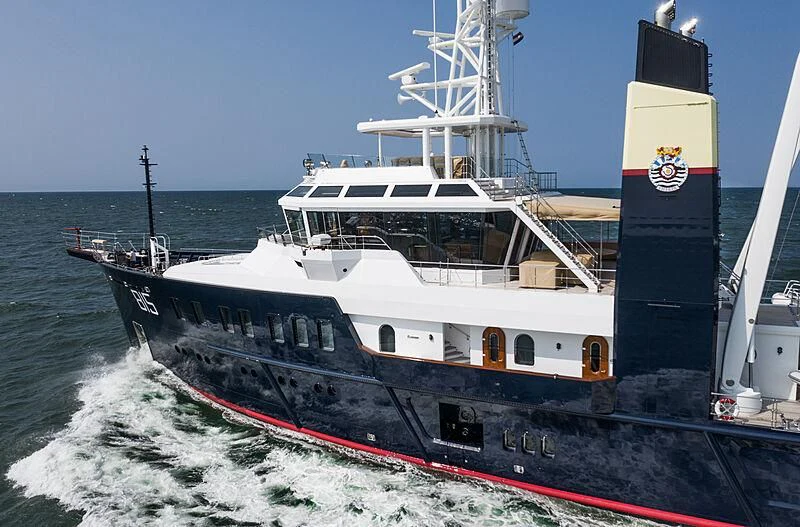 a large white boat on the water aboard SHERPA Yacht for Sale