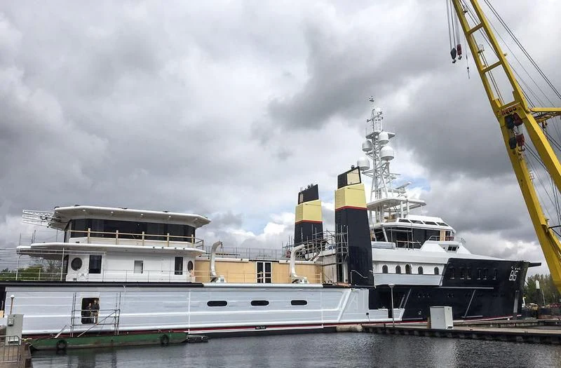 a large ship docked aboard SHERPA Yacht for Sale