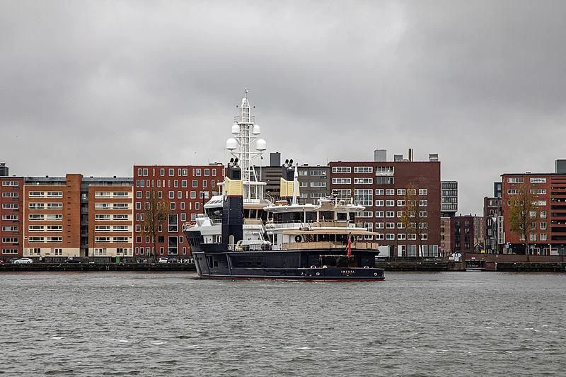 a large ship in the water aboard SHERPA Yacht for Sale