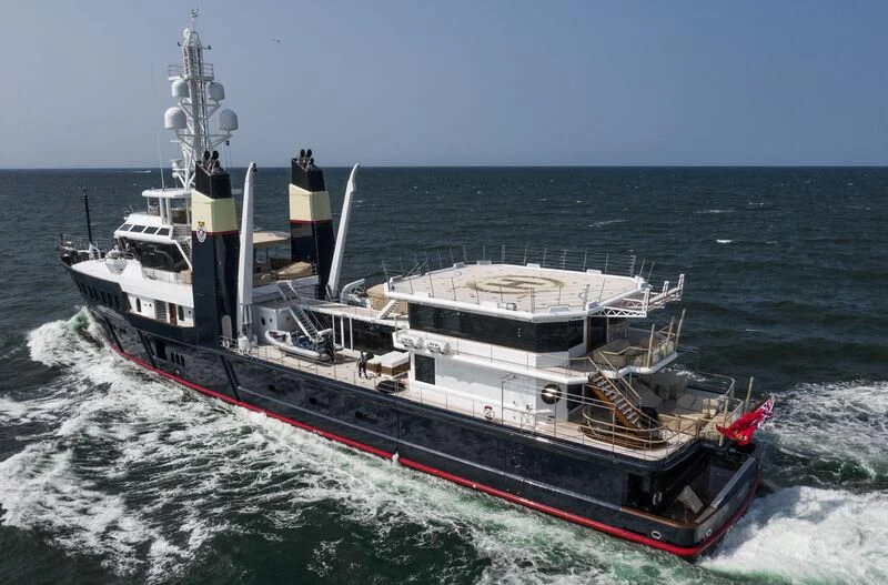 a large ship in the water aboard SHERPA Yacht for Sale