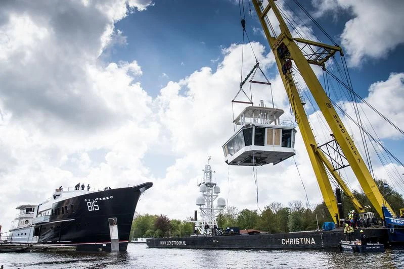 a large crane next to a boat aboard SHERPA Yacht for Sale