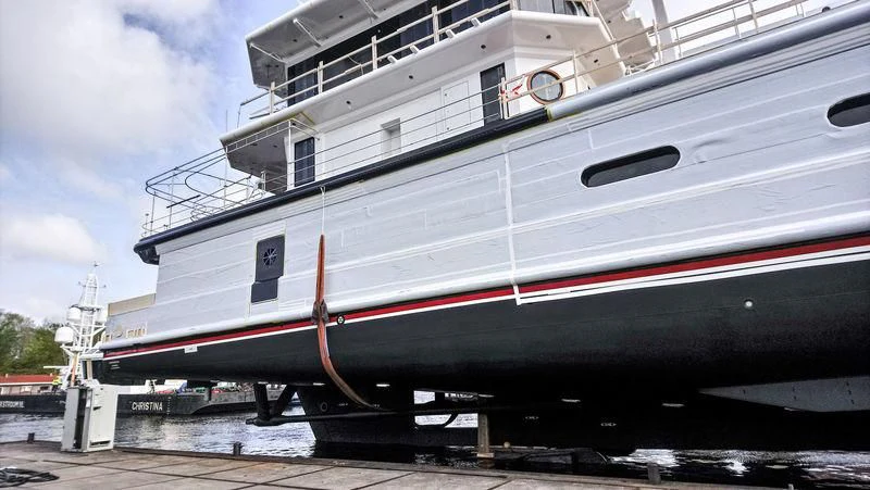 a large white boat aboard SHERPA Yacht for Sale