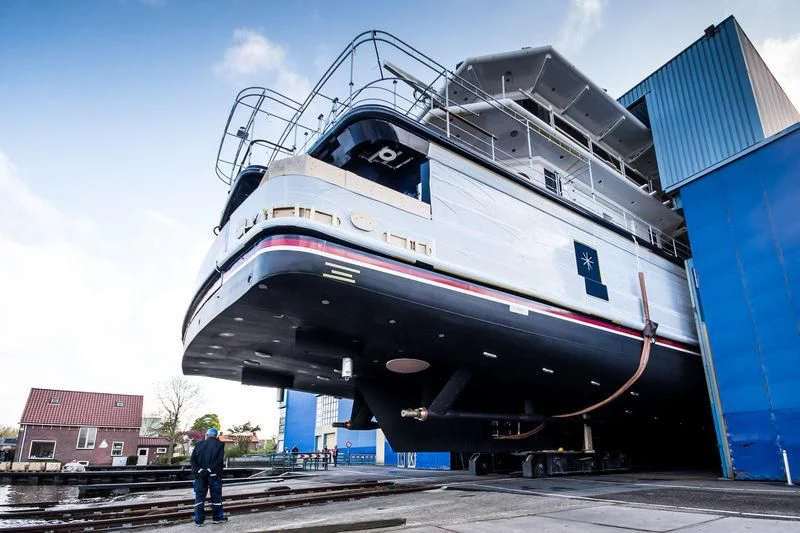 a large metal boat on a trailer aboard SHERPA Yacht for Sale