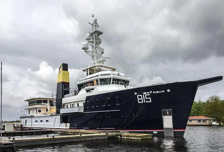 a large ship docked aboard SHERPA Yacht for Sale
