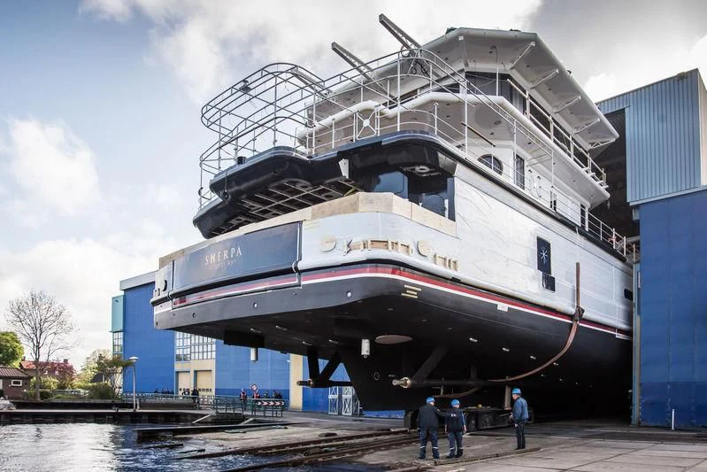 a large ship docked aboard SHERPA Yacht for Sale