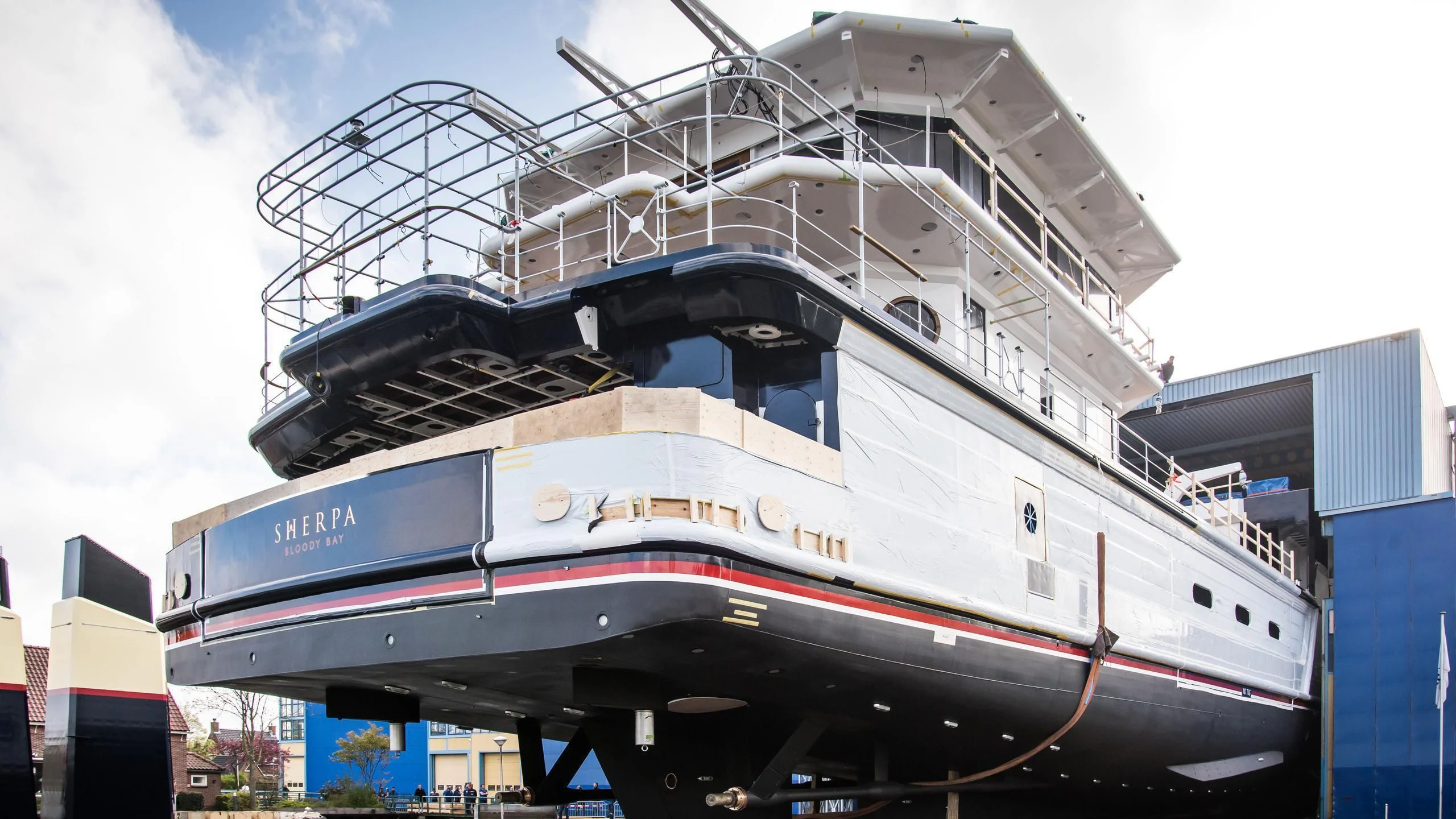 a large boat docked aboard SHERPA Yacht for Sale