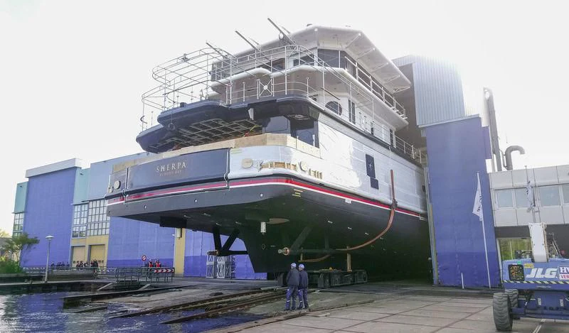 a large ship docked aboard SHERPA Yacht for Sale