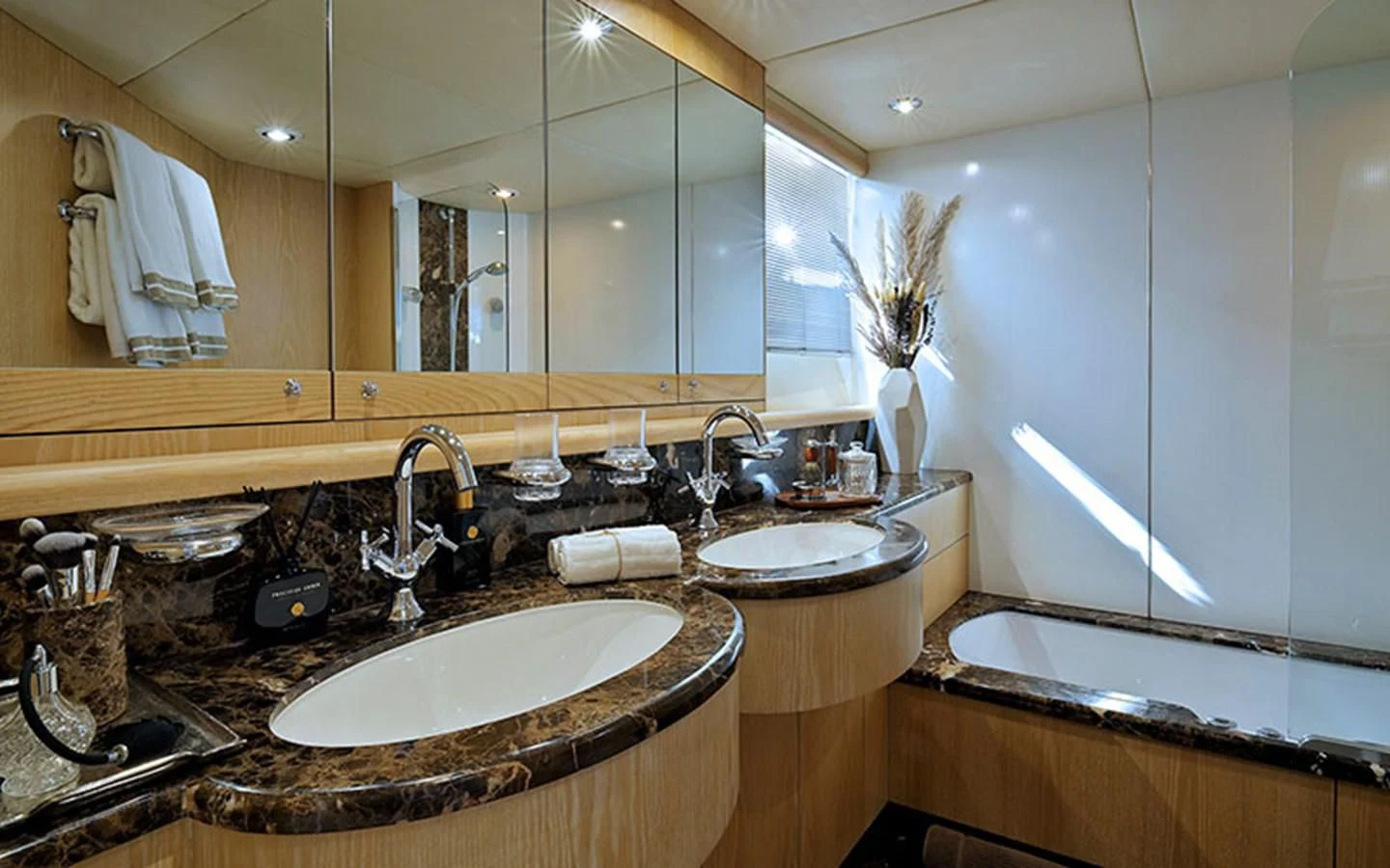a bathroom with a large mirror aboard EXCELERATE Z Yacht for Sale