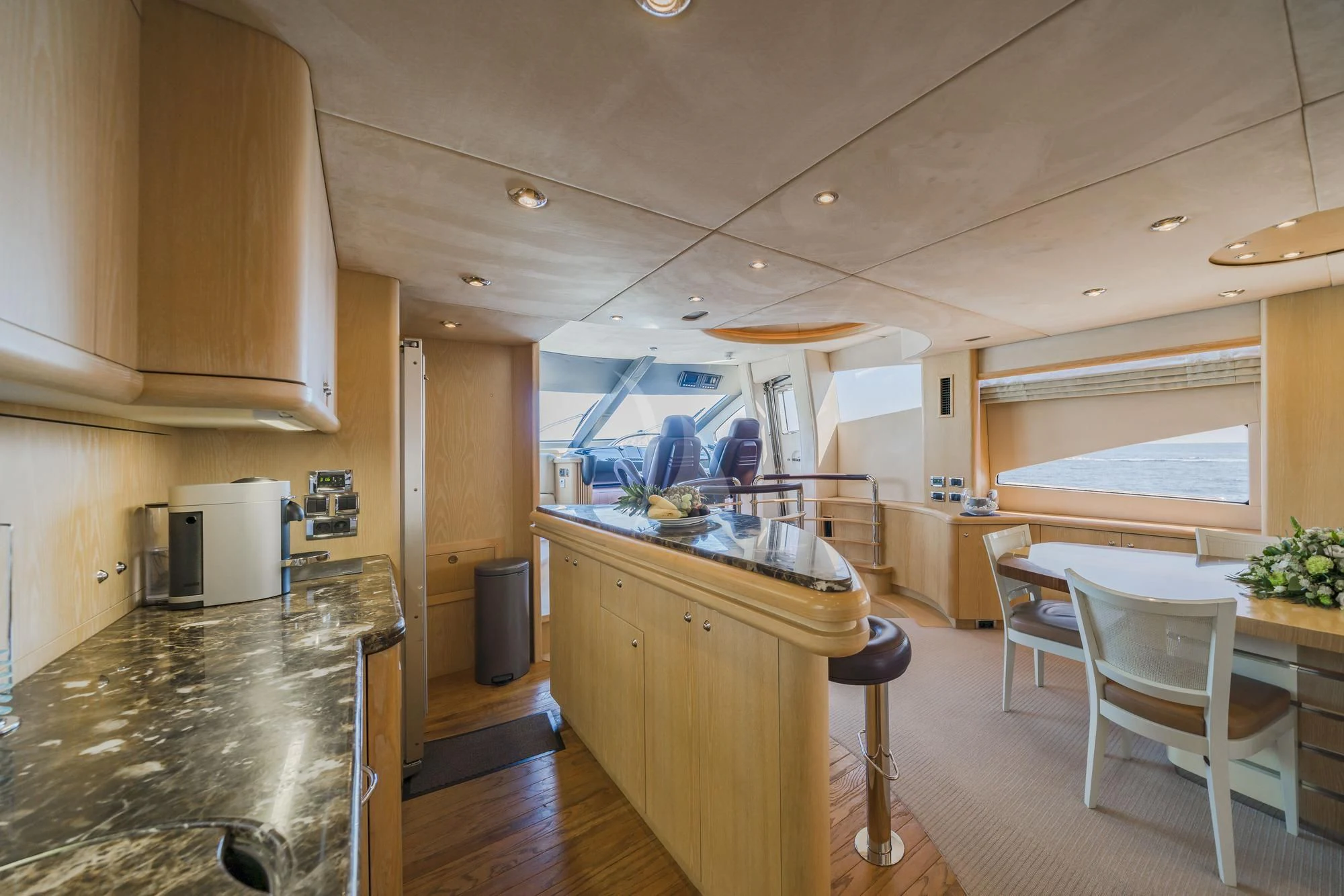 a kitchen with a large island aboard EXCELERATE Z Yacht for Sale